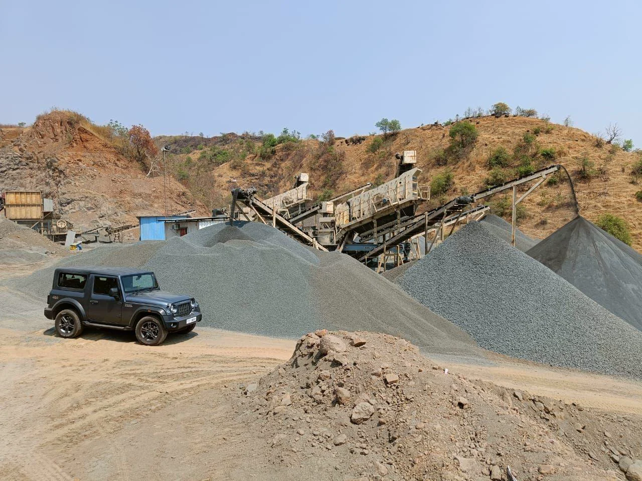 Capitan's crushing plant and graded stockpiles at the Kudus site